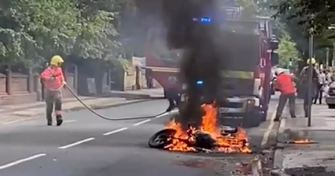 Moment motorbike goes up in flames after 'commotion' on busy road