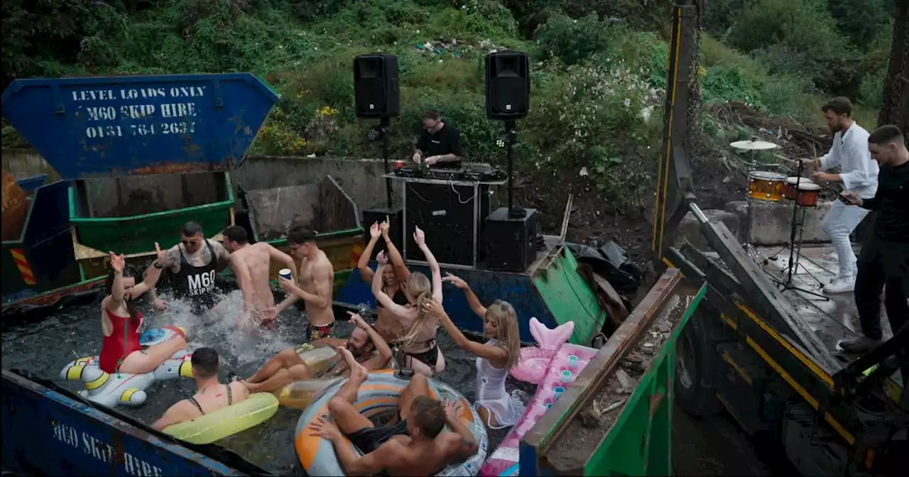 Moment staff at Bury firm throw wild pool party...in a SKIP