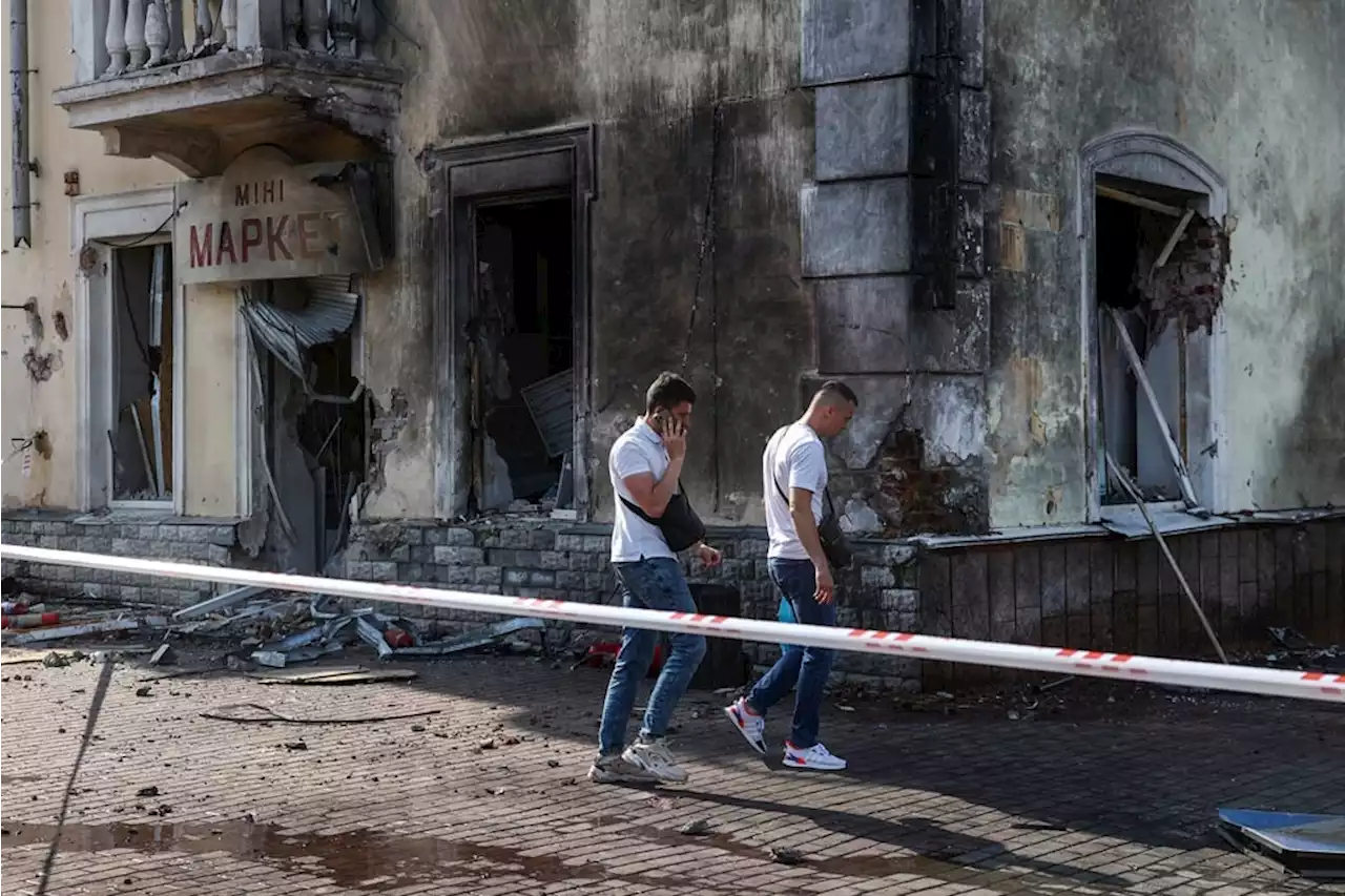 Russia hits Ukraine city centre after Putin meets generals