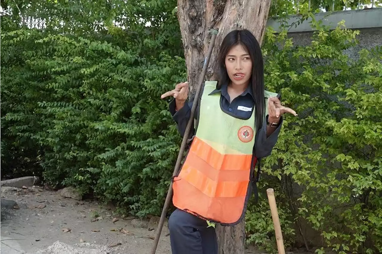 Thailand’s ‘most beautiful’ road sweeper brushes off criticism and defies stereotypes