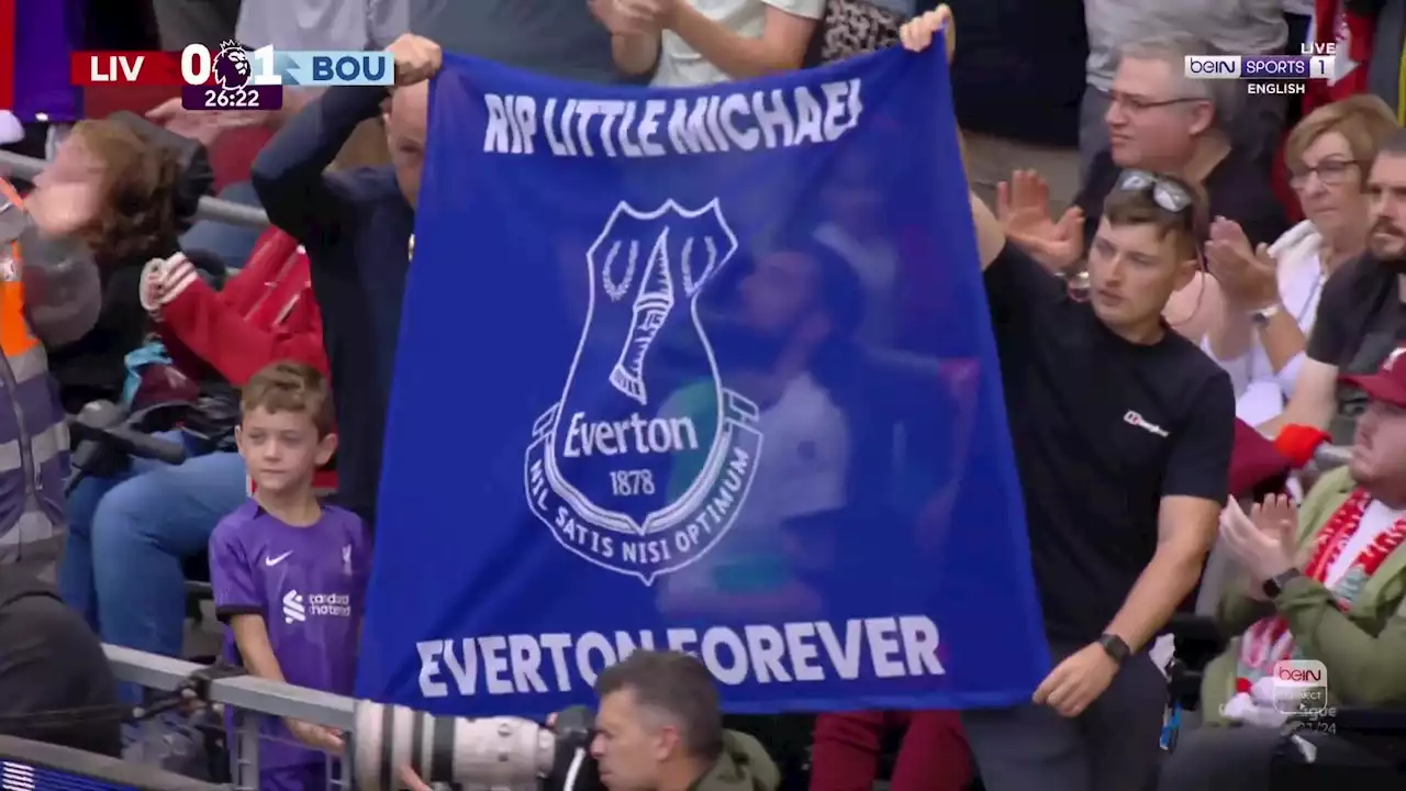 Liverpool fans hold up Everton flag in classy tribute to fan who died on building site