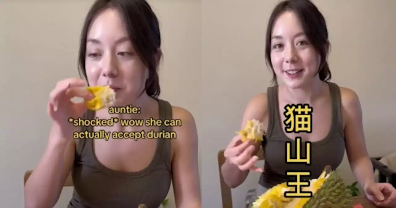 'We accept you now': American woman's first taste of durian in Singapore leaves locals impressed