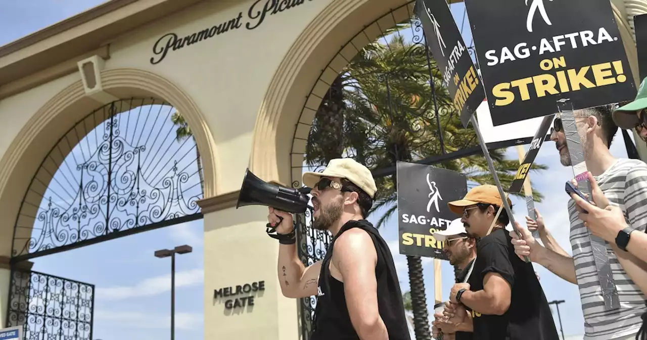 Hollywood writers and studios schedule first meeting since strike began