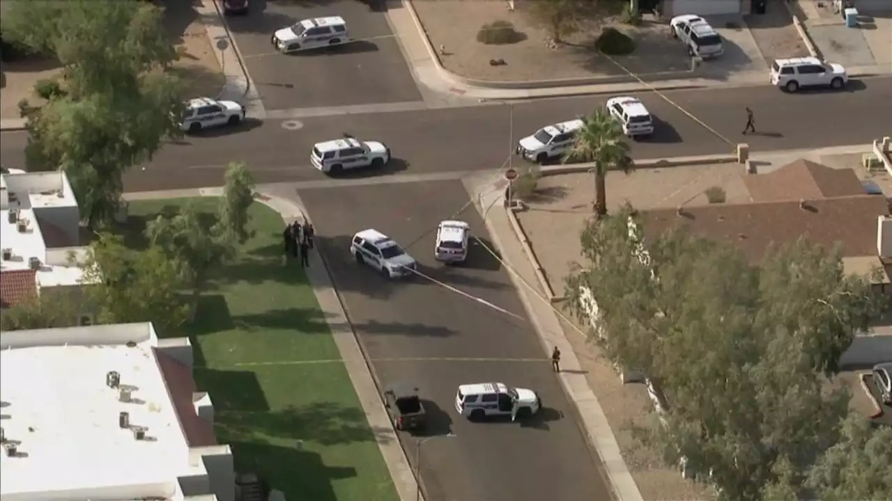 Suspect shot by Phoenix Police, another is detained; no officers injured