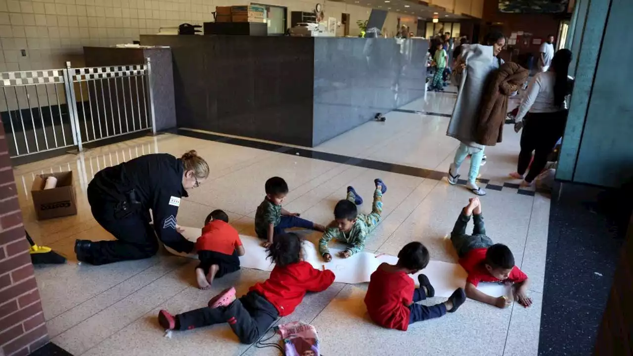 Hundreds of migrants moved from temporary shelters, South Loop police station ahead of Lollapalooza