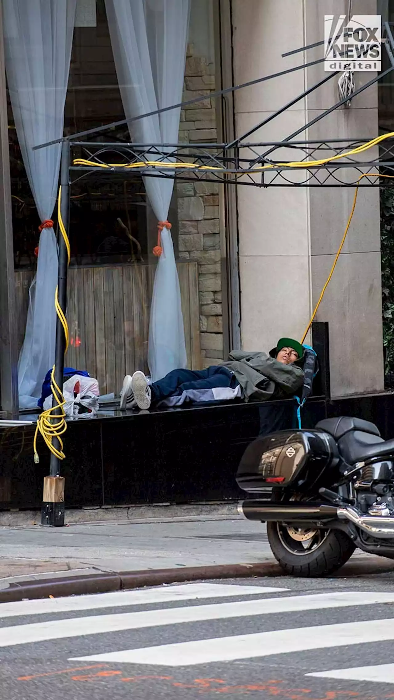 Asylum seekers sleep on New York City sidewalk with Manhattan's Roosevelt Hotel at full capacity