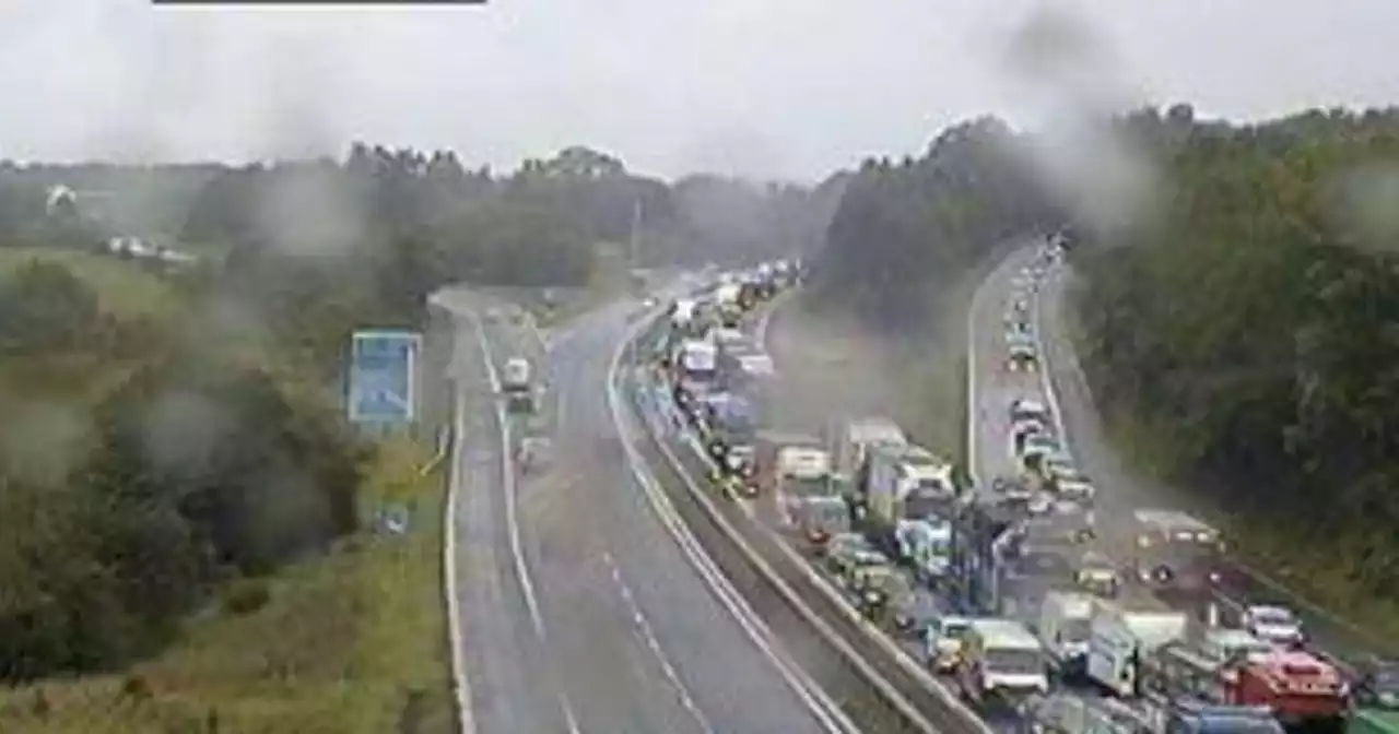 M74 motorway crash causes rush-hour tailbacks as emergency services at scene