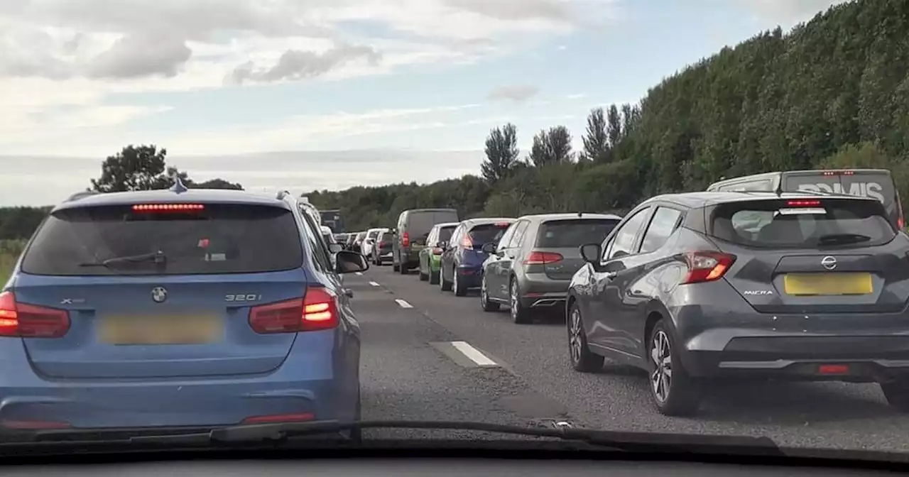 Car smashes into M61 central reservation and bridge in major crash