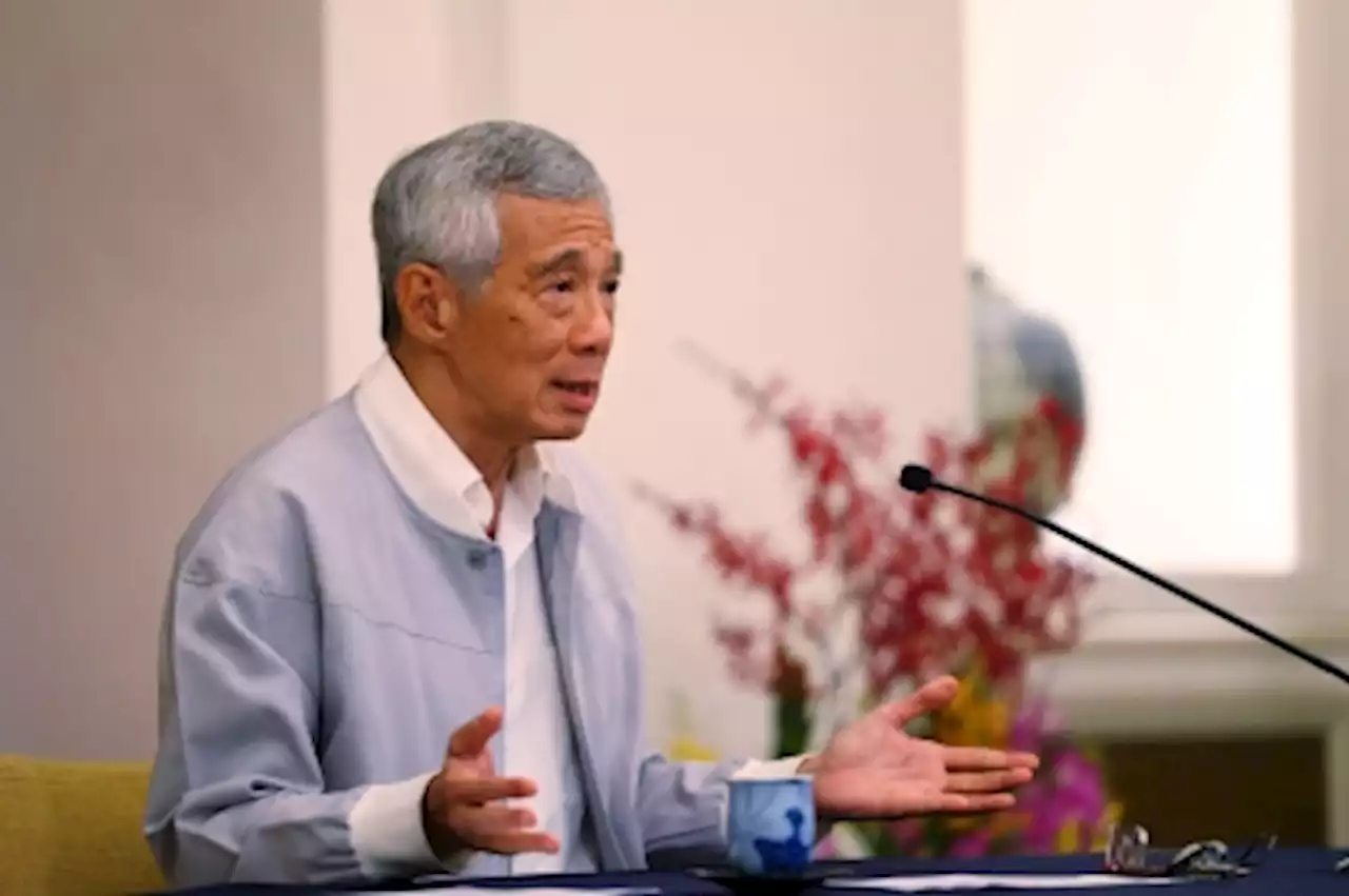 Singapore PM Lee: Transport minister under graft probe barred from duty until further notice