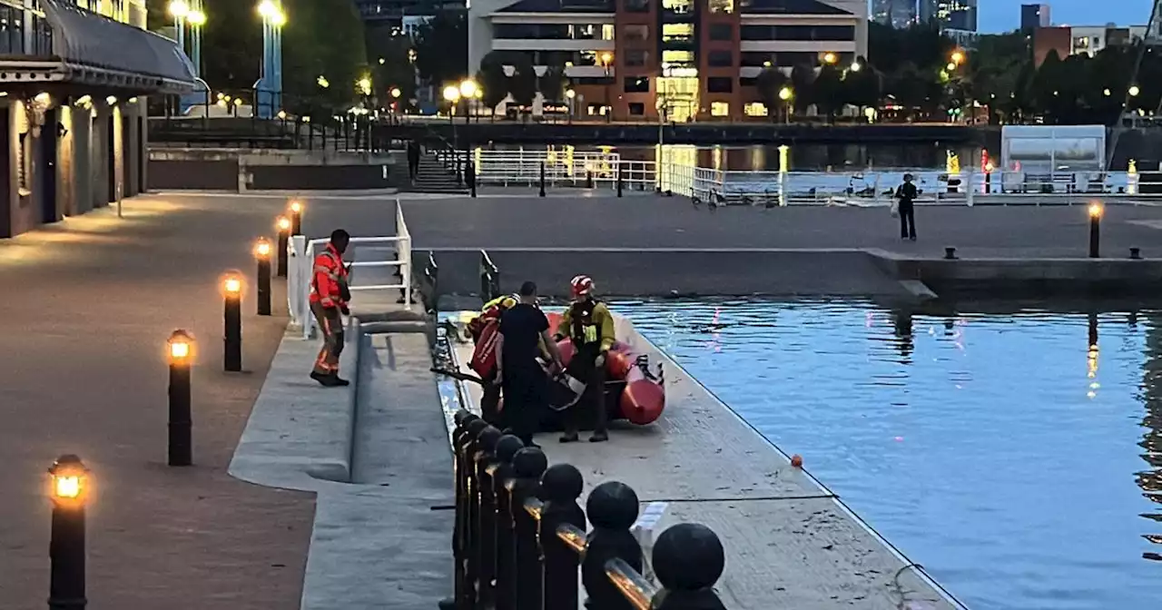 Rescue team descends on Salford Quays after 'person jumped in water'