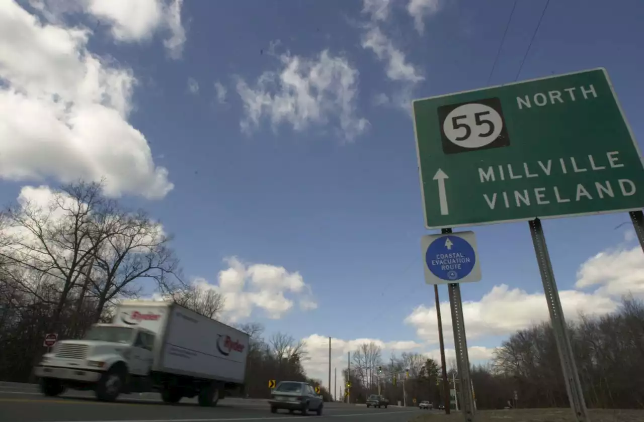 Dump truck strikes N.J. highway overpass