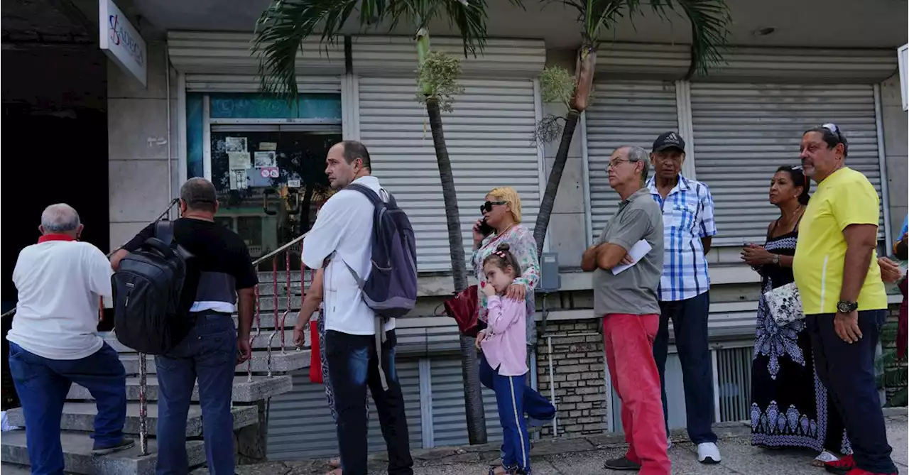 Cubans struggle as peso loses half its value in a year on informal market