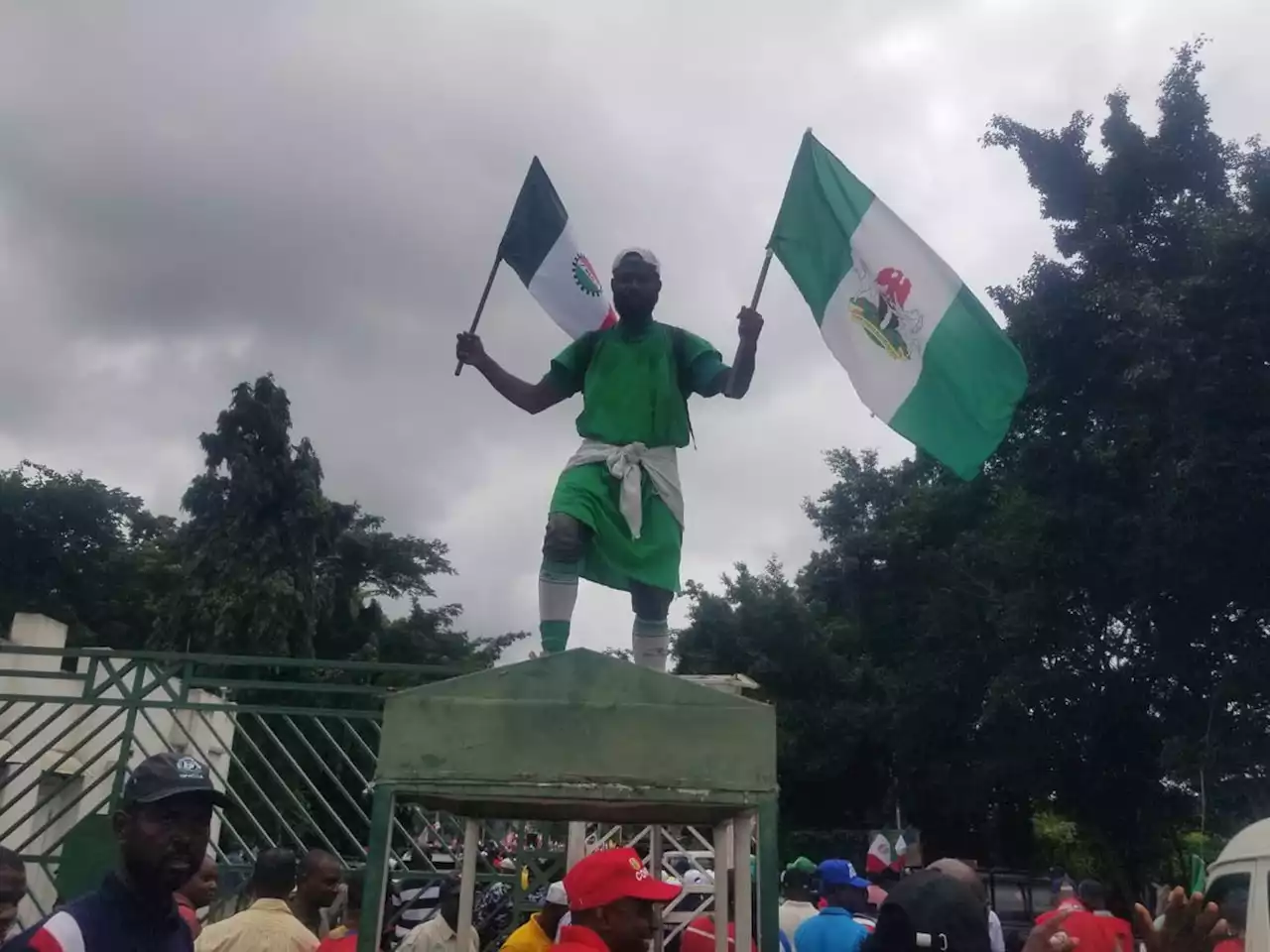 NLC protesters pull down national assembly gate, force their way into complex | TheCable