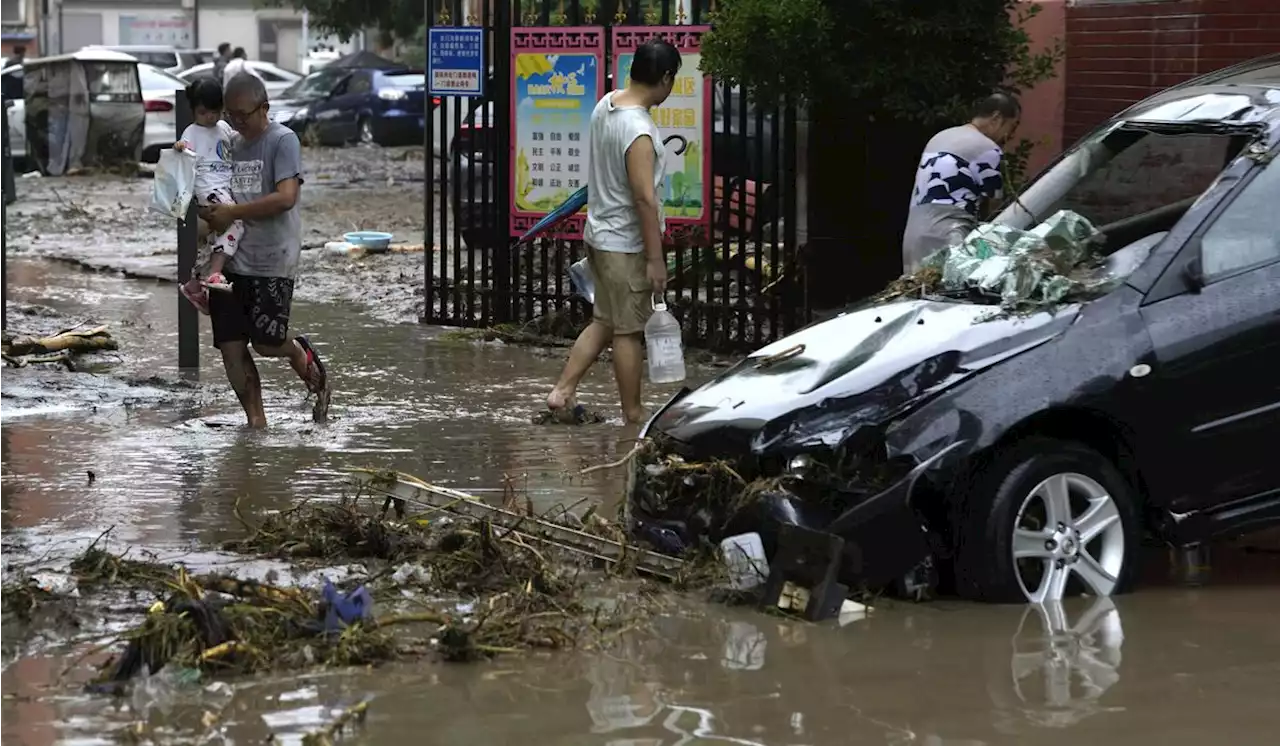 Floods around Chinese capital kill at least 20, leave 27 missing as thousands evacuated