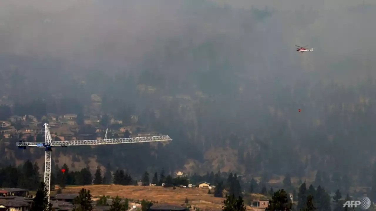 Around 30,000 ordered to flee wildfires in western Canada's British Columbia