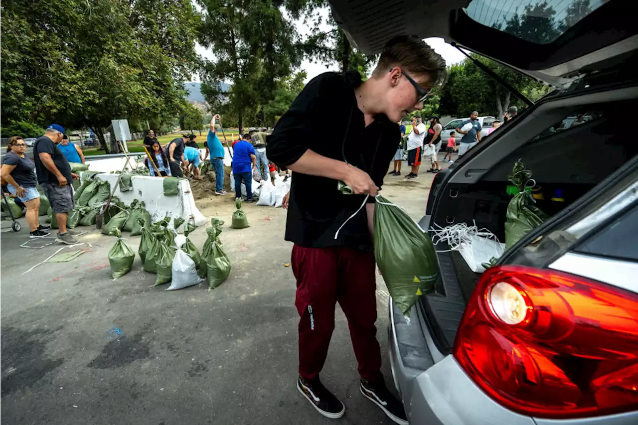 Hilary becomes a tropical storm, as Mexico and California brace for deadly rainfall