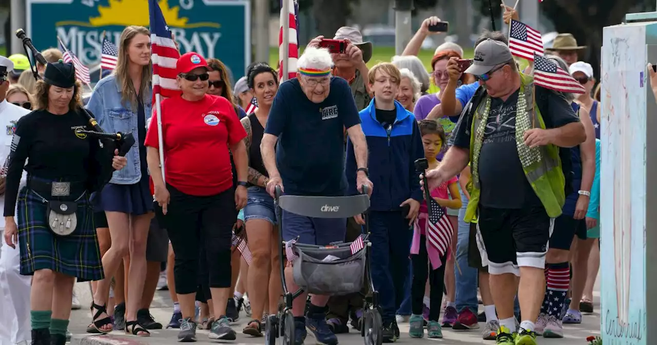 WWII veteran finishes journey across America at Mission Beach on 100th birthday