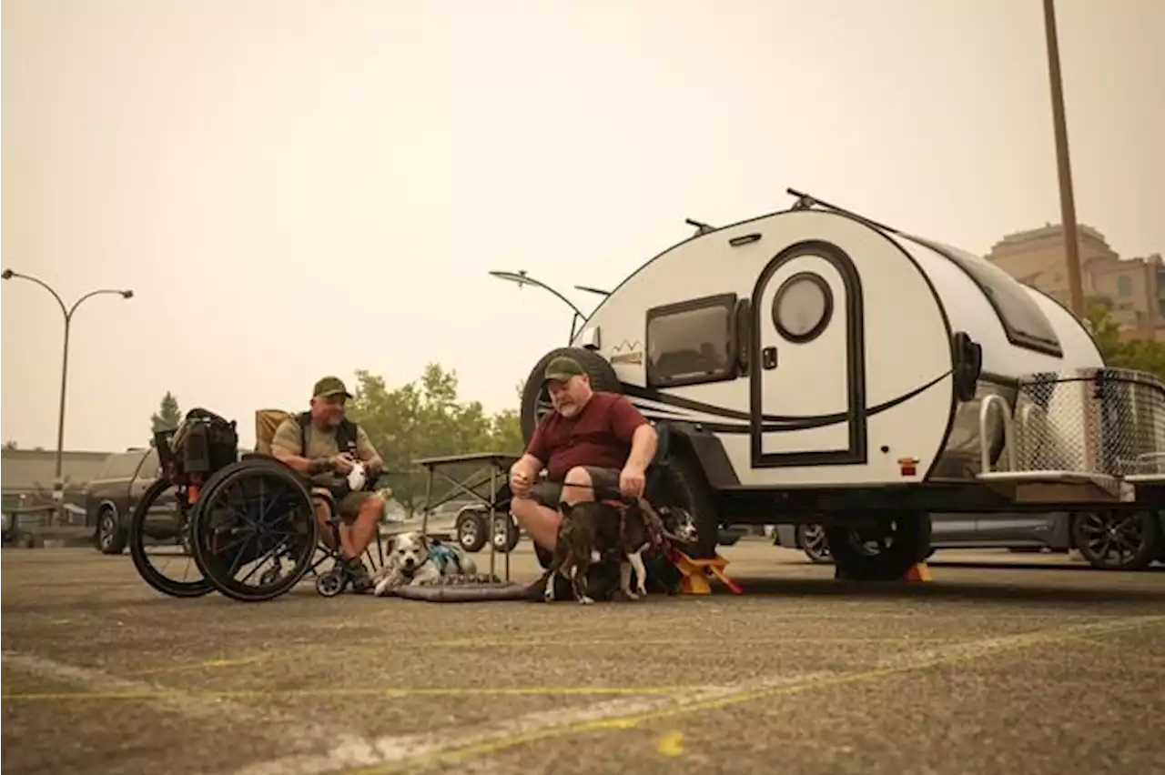 'We might not have a home': Fire evacuees in Kelowna parking lot ponder unclear fate