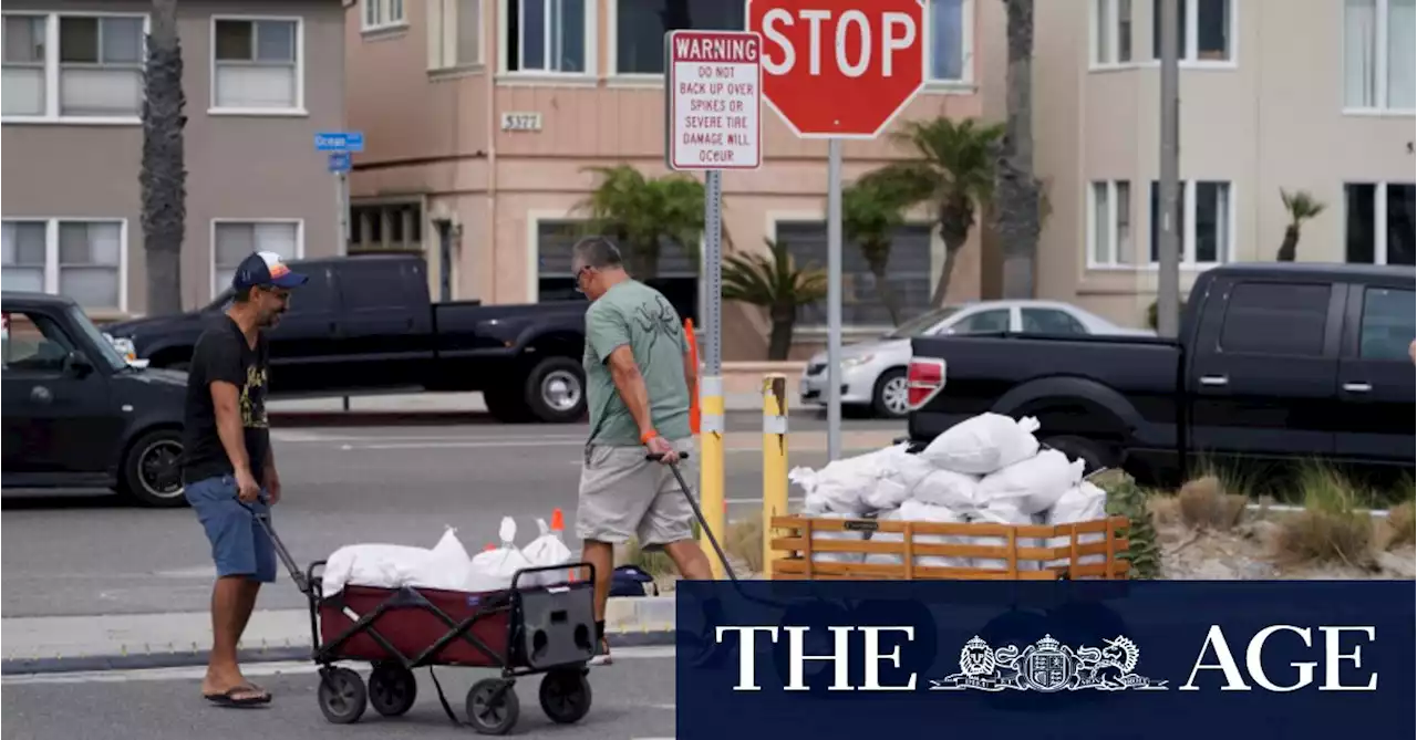 Bustling Los Angeles goes quiet, shelves empty as once-in-a-century storm approaches