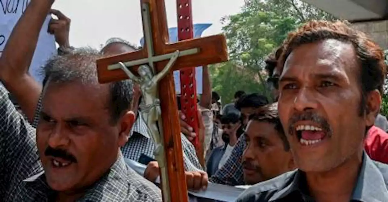 Christians pray among rubble of ransacked church in Pakistan