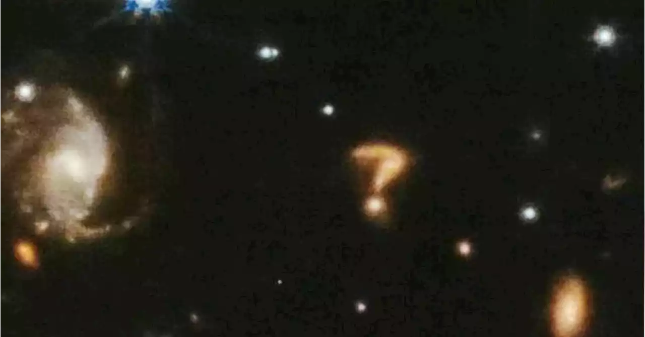 Mysterious glowing question mark spotted in space