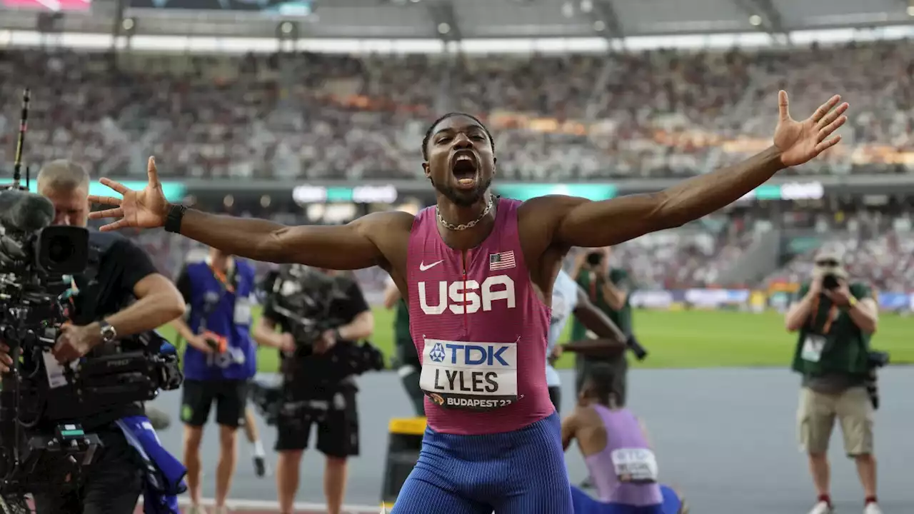 Noah Lyles breaks into tears on medal stand after receiving gold medal for 100-meter win at worlds