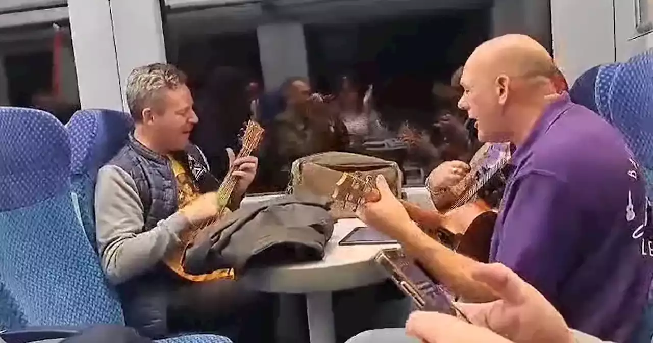 Watch: Ukulele group delights NI train passengers with a tune