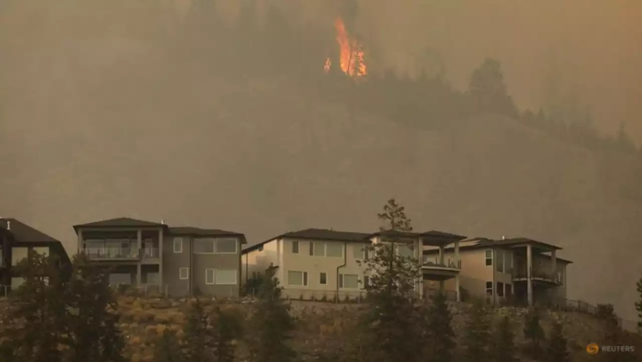 Cooler conditions bring some hope as Canada wildfires rage on