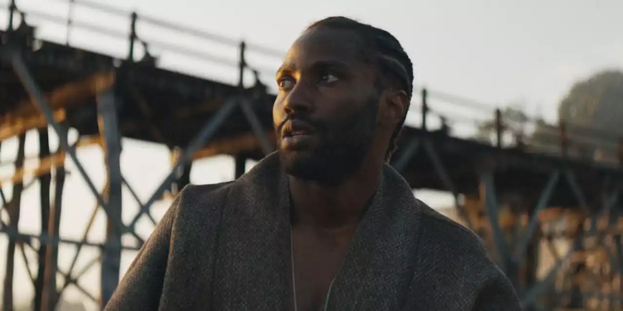 John David Washington Survives AI-Ridden Terrain in New 'The Creator' Poster