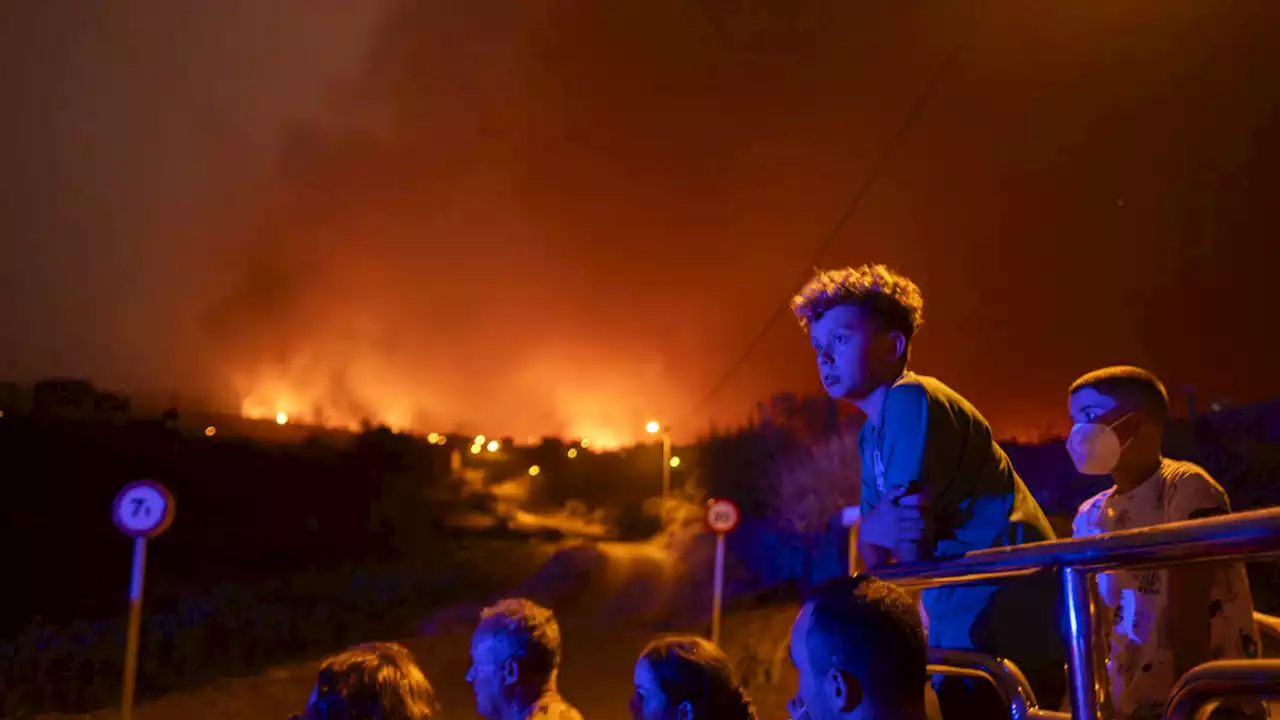 Major wildfires burn in Greece and Tenerife