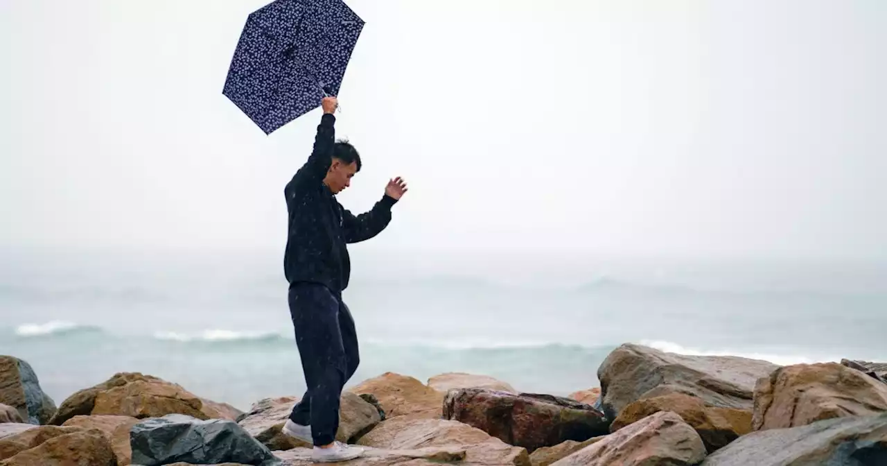 San Diegans take stock of initial damage as historic storm moves through region