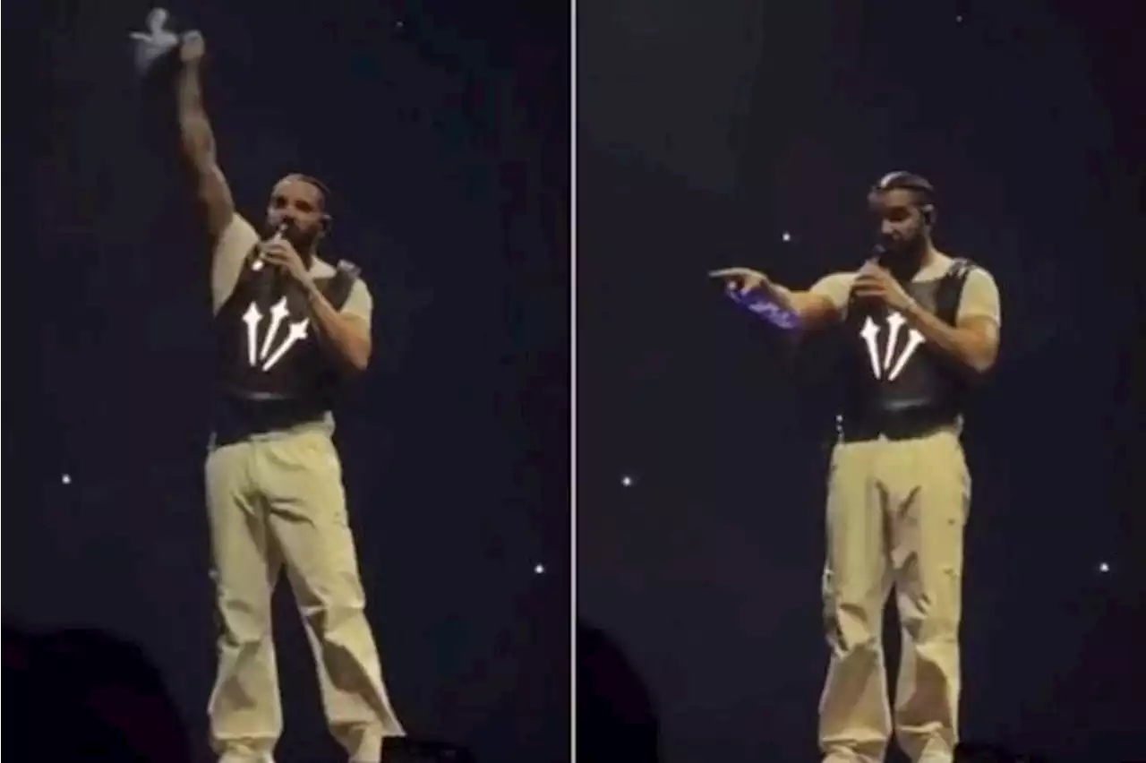 Rapper Drake catches book hurled at him during concert