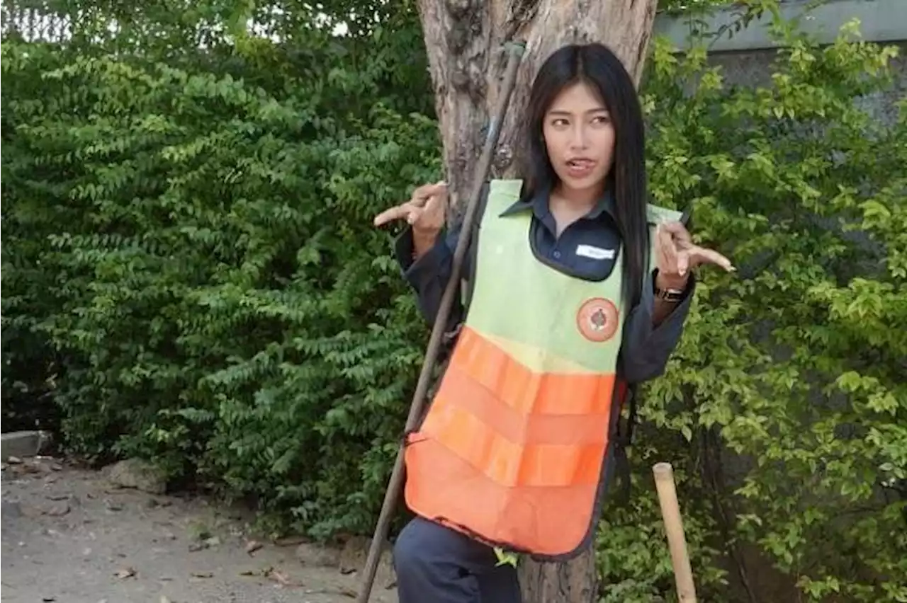 Thailand’s ‘most beautiful’ road sweeper brushes off criticism and defies stereotypes