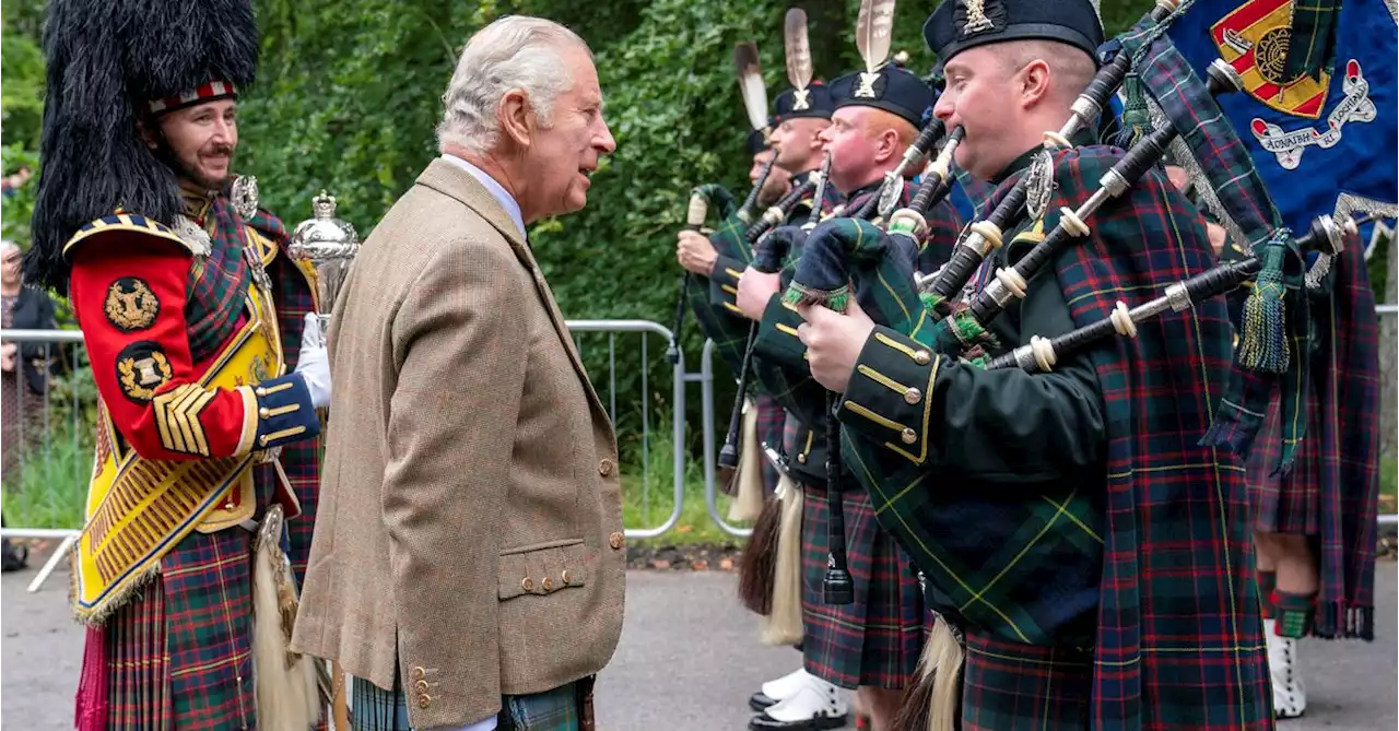 King Charles inspects the troops as he sets up summer in Scotland