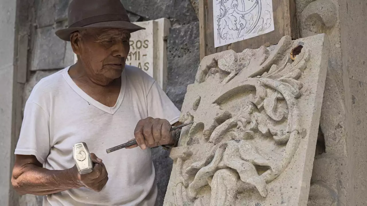 Traditional stone carvers chisel on despite loss of quarries in village swallowed by Mexico City