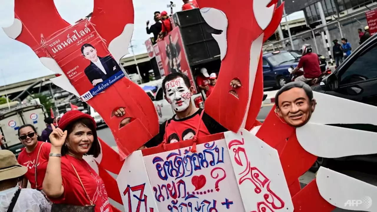 Thailand's Red Shirts return to streets to welcome Thaksin home