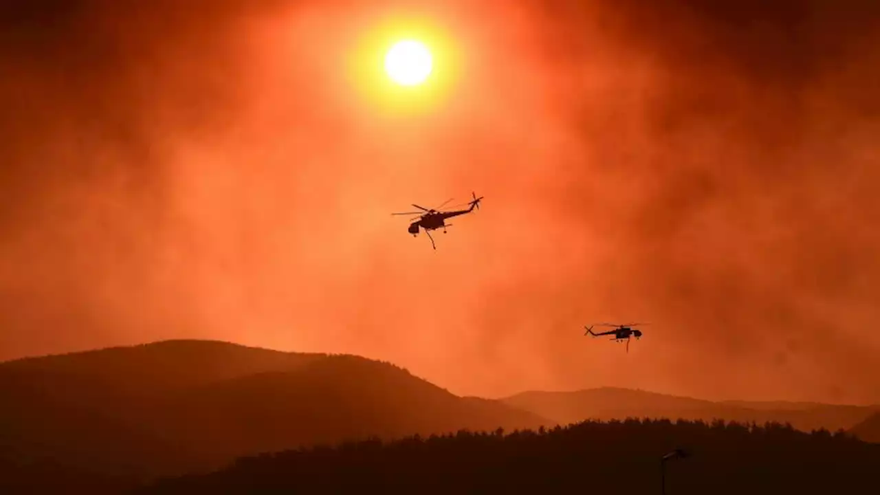 18 bodies found as fires rage in Greece and Europe suffers another heat wave