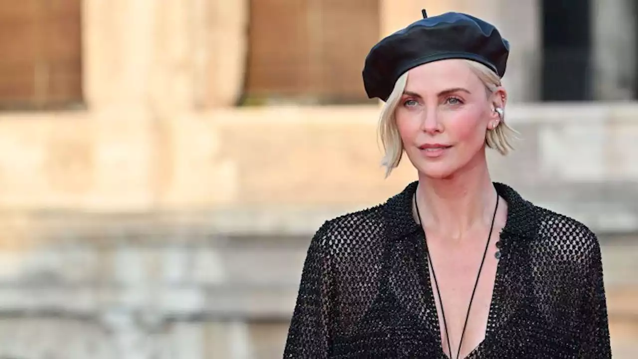 Charlize Theron denies she's had bad plastic surgery, says she's simply aging