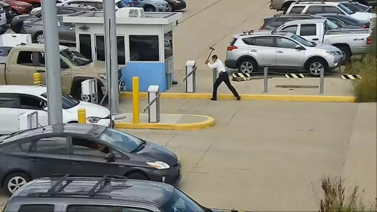 United Airlines pilot caught on video taking ax to parking barrier