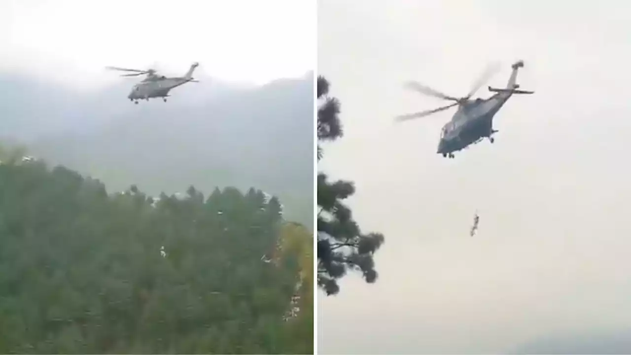 Terrifying moment child dangles from helicopter during daring rescue from Pakistan cable car