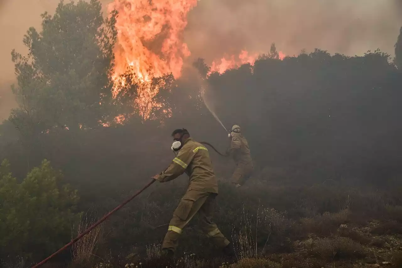 Two dead as Greece battles growing wildfire front