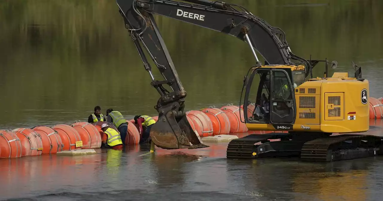 Judge to consider whether Texas can keep oversize buoy barrier on US-Mexico river border