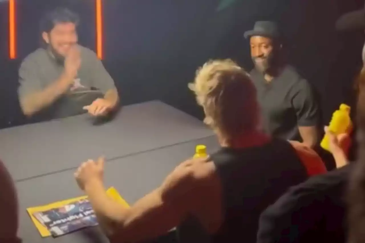 Logan Paul makes Dillon Danis flinch by pretending to throw PRIME bottle during joint interview