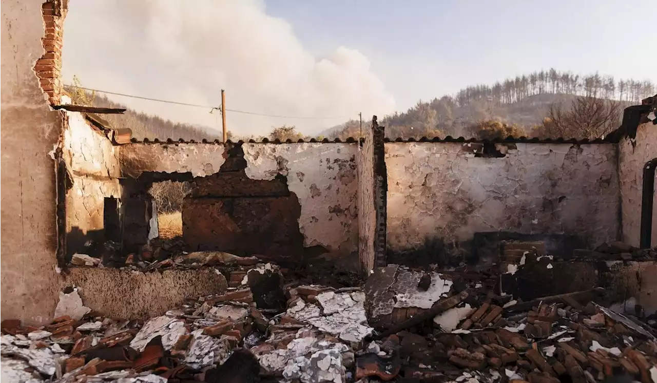 A major wildfire in northeastern Greece has forced the evacuation of villages and a city hospital