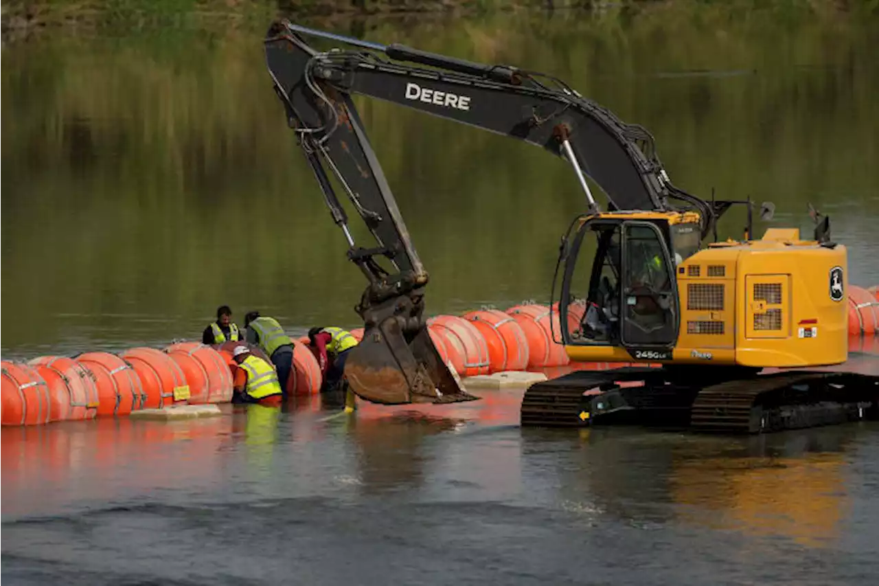 Judge to consider whether Texas can keep oversize buoy barrier on US-Mexico river border