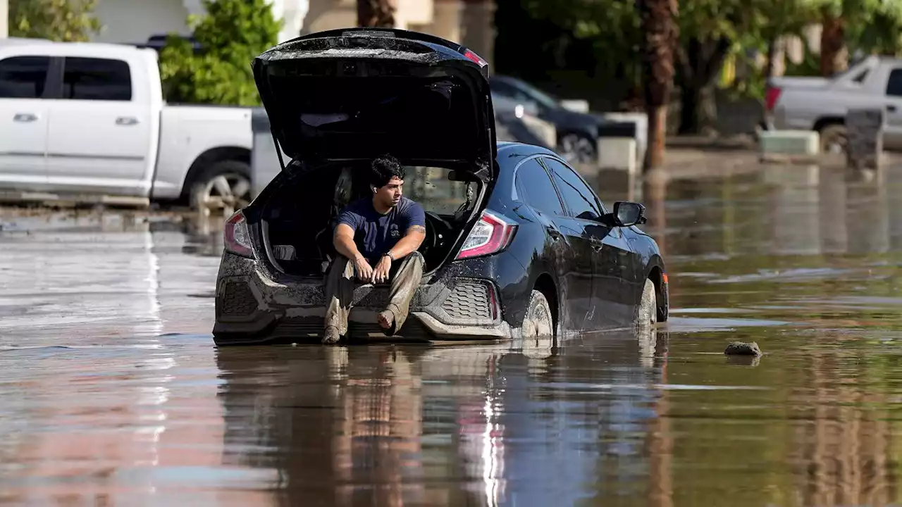 As Tropical Storm Hilary shrinks, desert and mountain towns dig themselves out of the mud