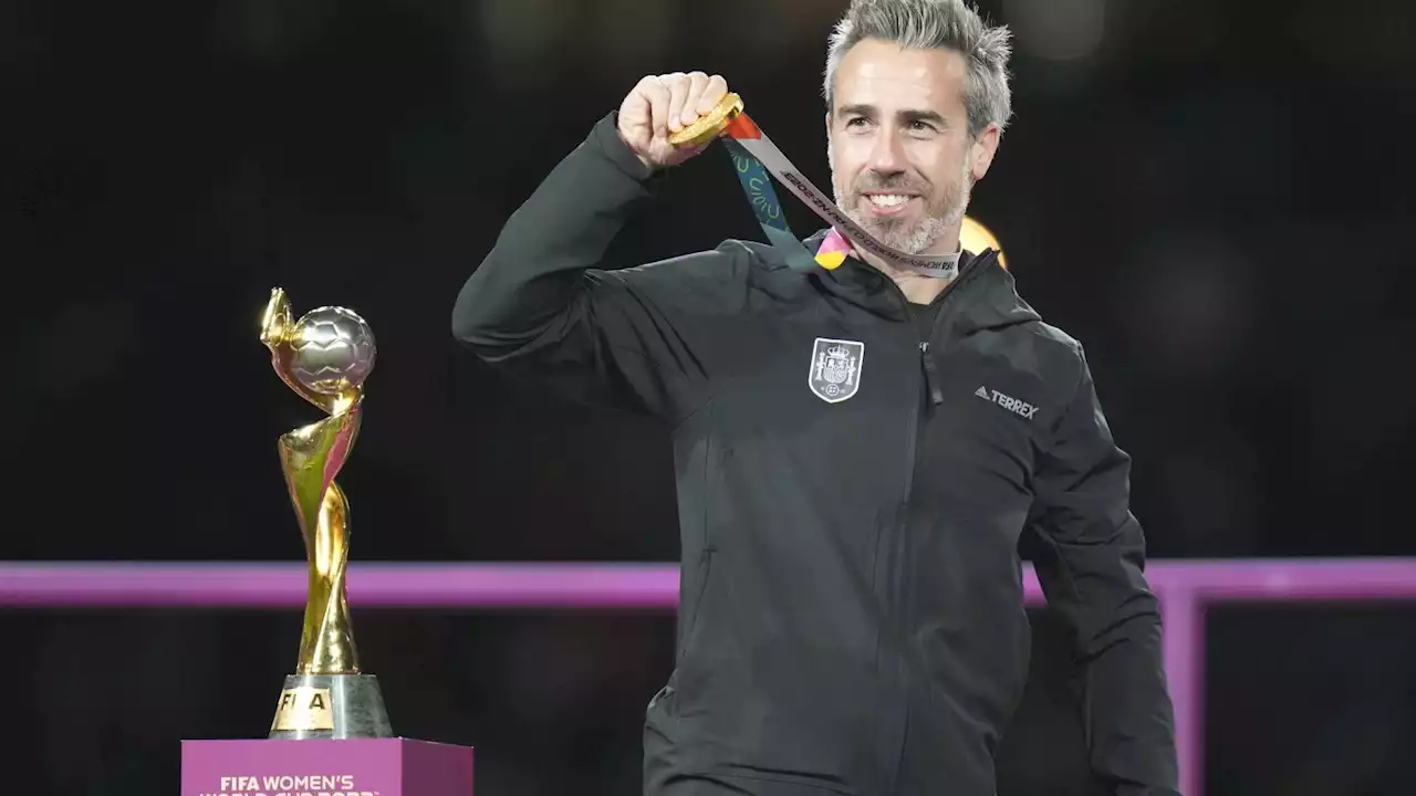 Spain soccer coach faces scrutiny for touching a female assistant on the chest while celebrating