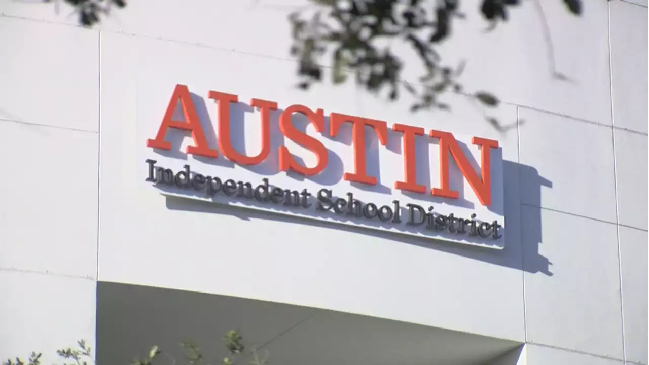 Protestors carrying anti-LGBTQ and anti-abortion signs disrupt dismissal at McCallum High School