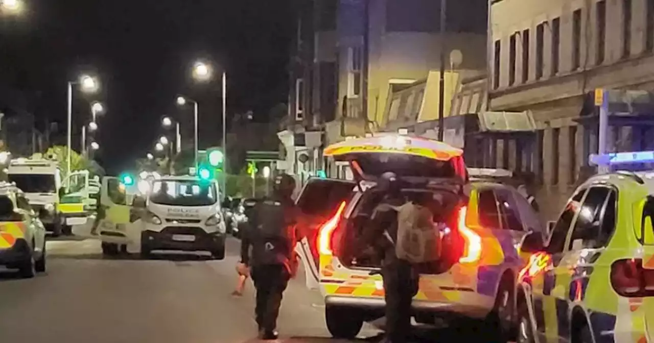 Armed officers descend onto busy Scots street after late-night incident