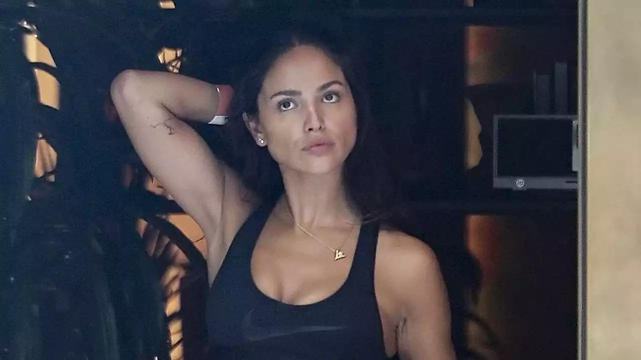 Eiza Gonzalez bares her washboard abs in a black sports bra in LA